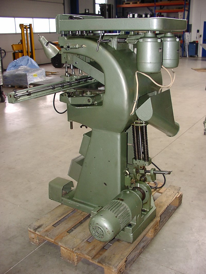 Used Hang 106 TK 4 four heads paper drill machine year 1990 PressCity