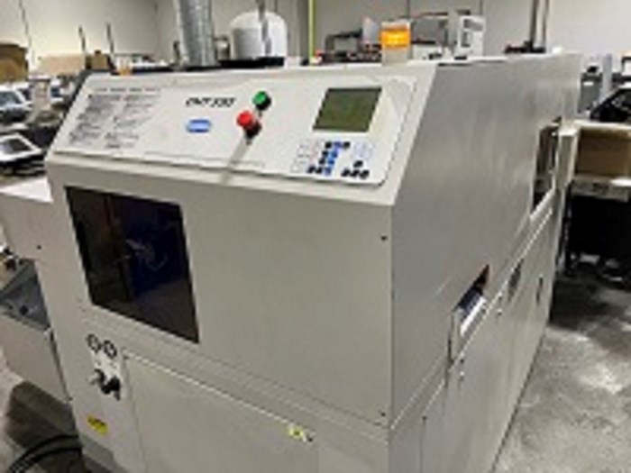 Challenge CMT330 automated three knife trimmer.
